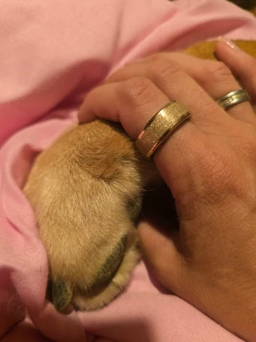 Gold smart ring on hand